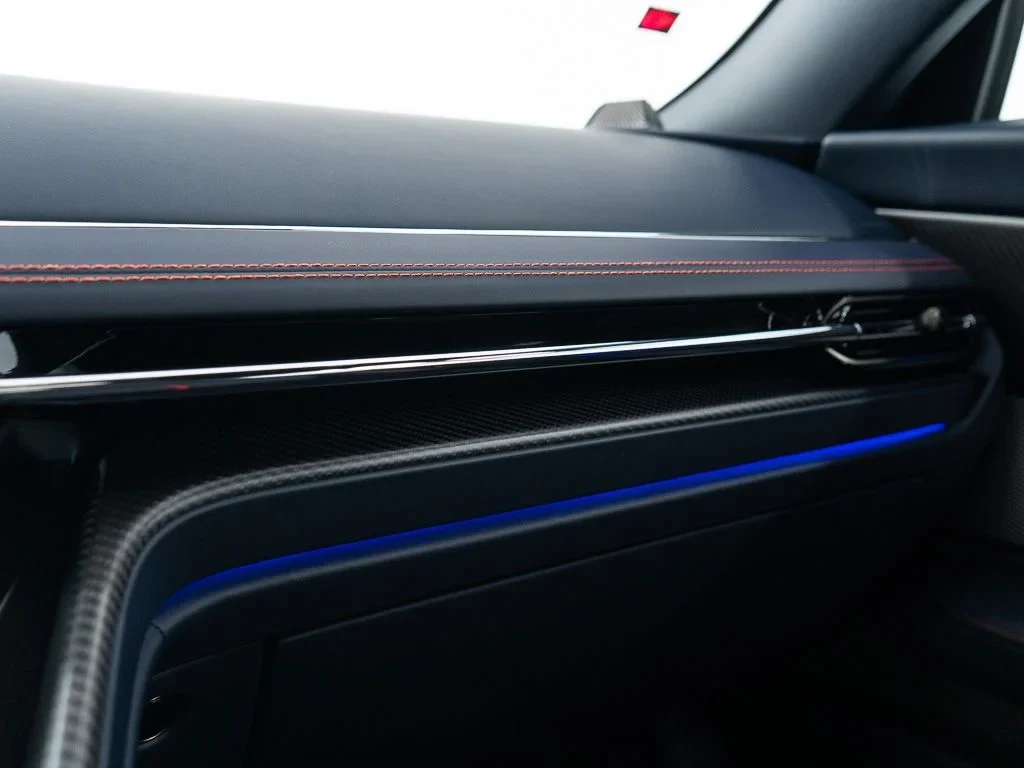 2026 Aston Martin DB12 S interior, door panel, Dark Knight w/Stitching in Spicy Red