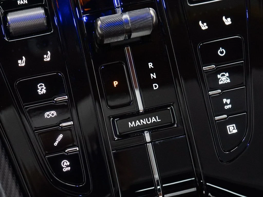 2026 Aston Martin DB12 S interior, center console, Copper Tan Metallic