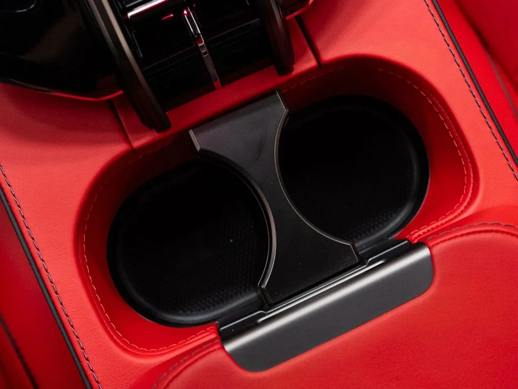 2026 Aston Martin Vantage S Roadster interior, center console, Spicy Red w/Stitching in Obsidian Black