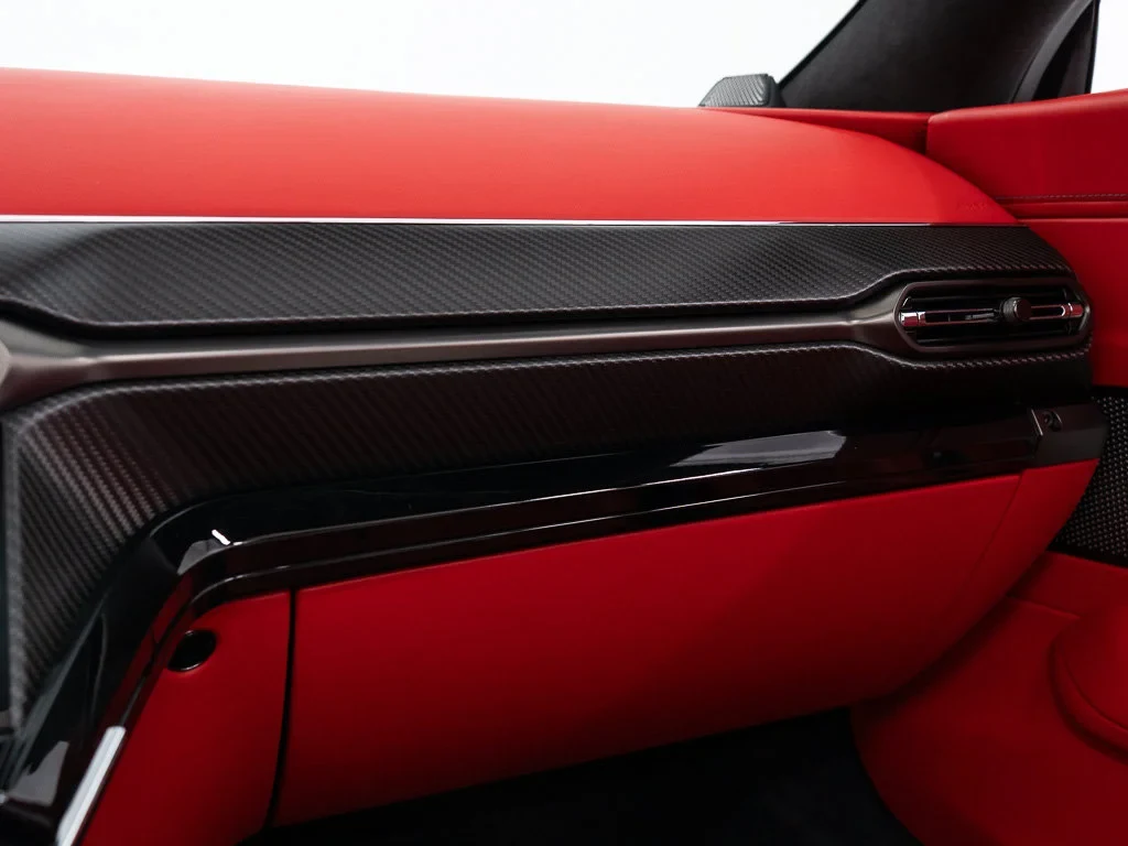 2026 Aston Martin Vantage S Roadster interior, door panel, Spicy Red w/Stitching in Obsidian Black