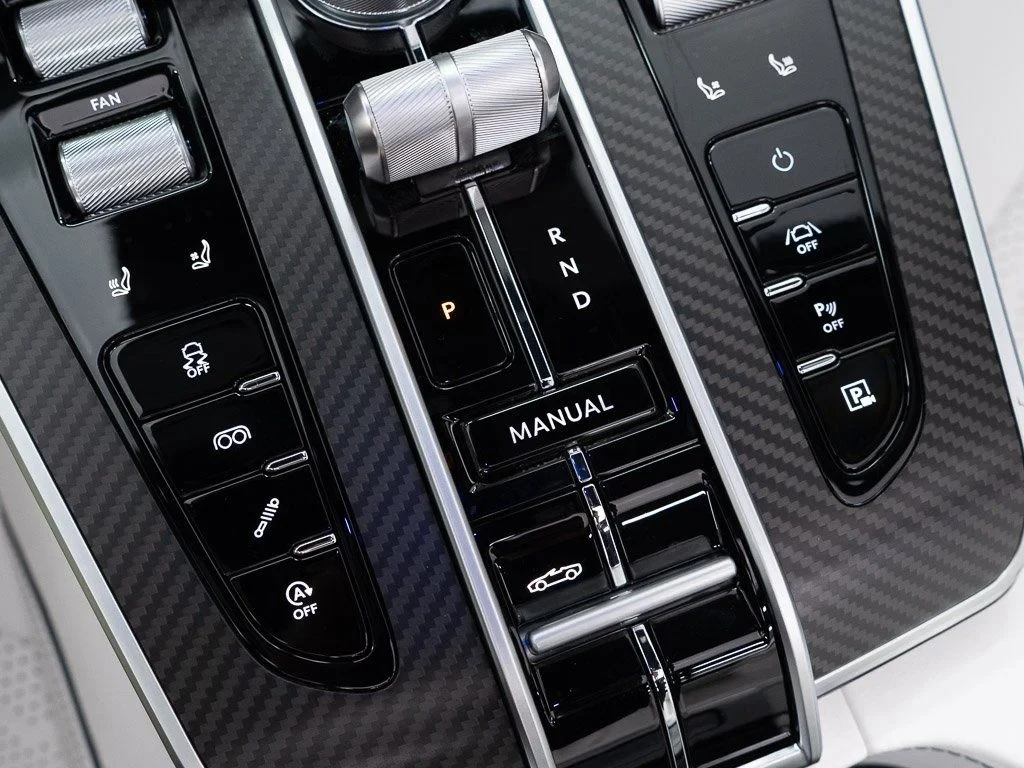 2026 Aston Martin Vanquish Volante interior, center console, Dark Knight / Q Glacier White