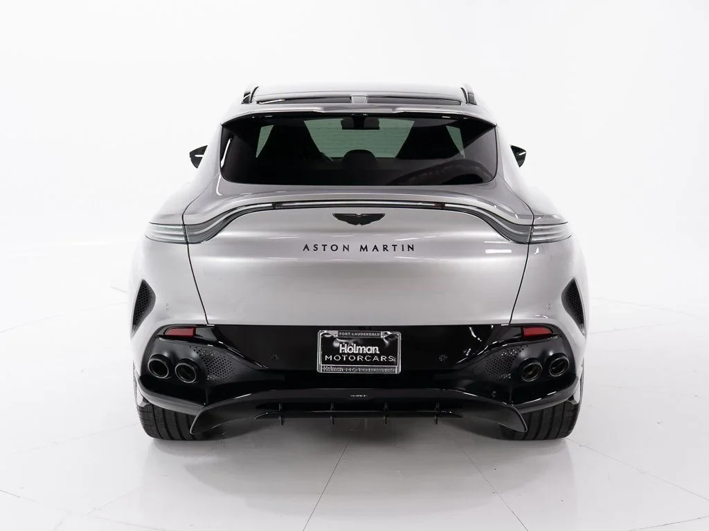 2026 Aston Martin DBX 707, rear three-quarter view, Q Spirit Silver