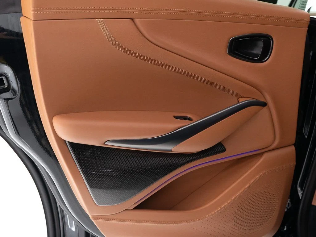 2026 Aston Martin DBX 707 interior, door panel, Q Centenary Saddle Tan