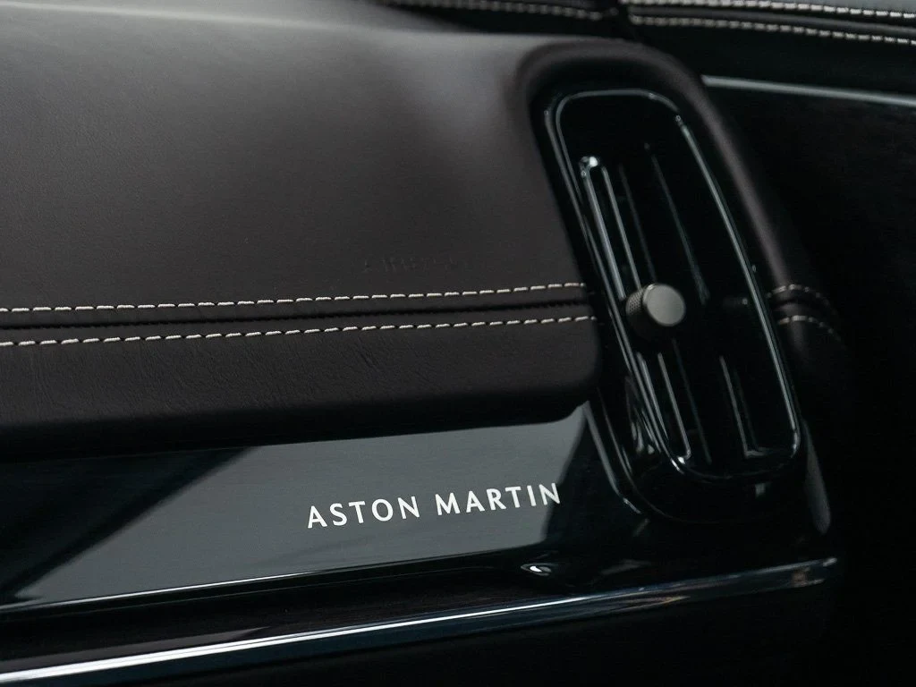 2026 Aston Martin DBX 707 interior, door sill, Metallic Black