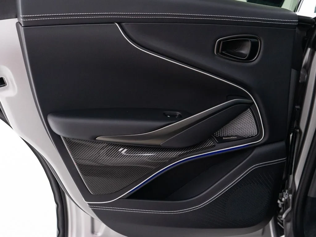 2026 Aston Martin DBX S interior, door panel, Onyx Black w/Stitching in Silver
