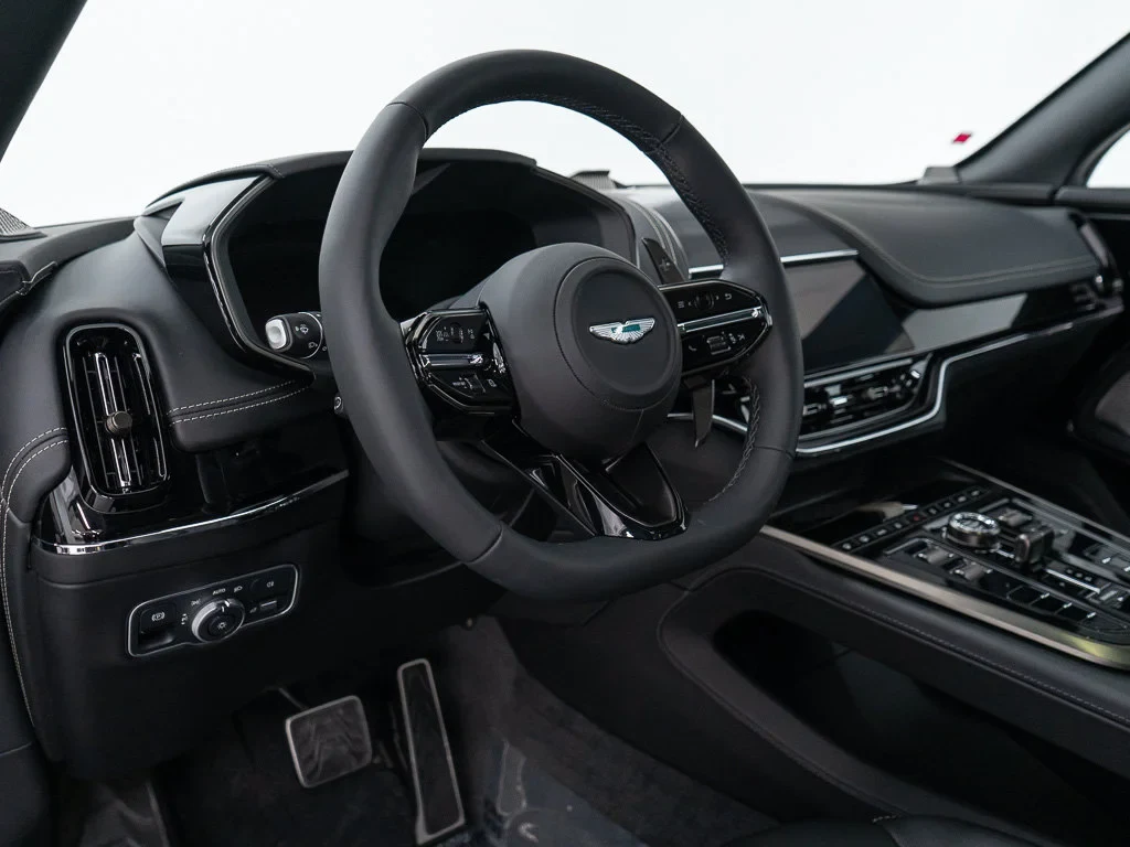 2026 Aston Martin DBX S interior, dashboard, Onyx Black / Arden Green Metallic