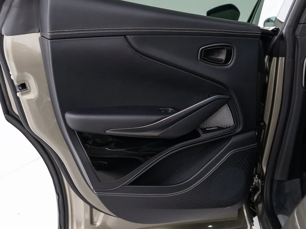 2026 Aston Martin DBX S interior, door panel, Onyx Black / Arden Green Metallic