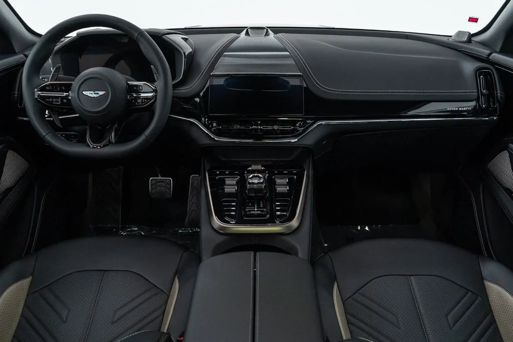 2026 Aston Martin DBX S interior, dashboard, Onyx Black / Arden Green Metallic