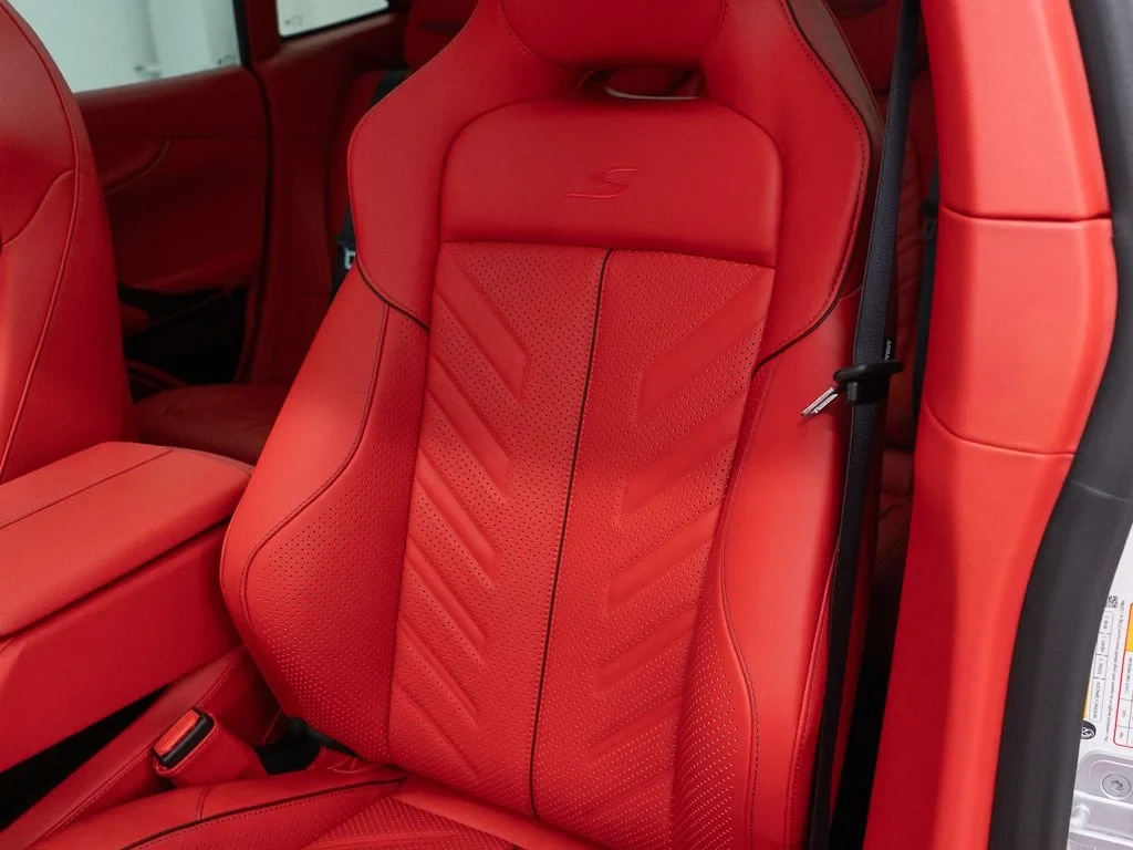2026 Aston Martin DBX S interior, seats, Spicy Red w/Stitching in Obsidian Black