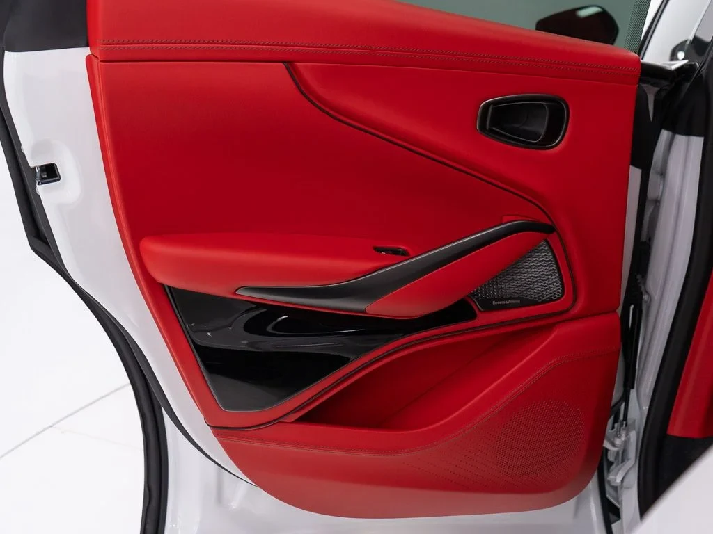 2026 Aston Martin DBX S interior, door panel, Spicy Red w/Stitching in Obsidian Black