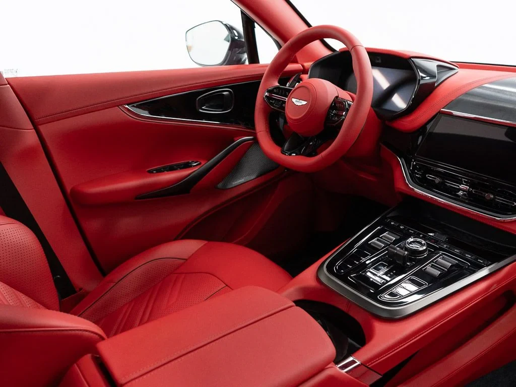 2026 Aston Martin DBX S interior, Spicy Red w/Stitching in Obsidian Black