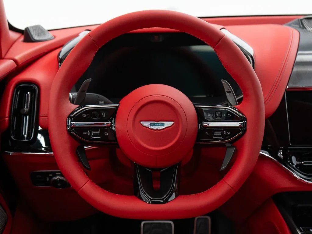 2026 Aston Martin DBX S interior, Spicy Red w/Stitching in Obsidian Black