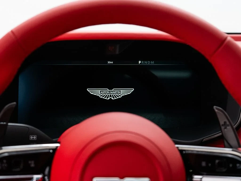 2026 Aston Martin DBX S interior, Spicy Red w/Stitching in Obsidian Black