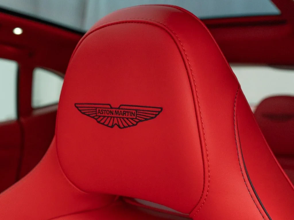 2026 Aston Martin DBX S interior, Spicy Red w/Stitching in Onyx Black