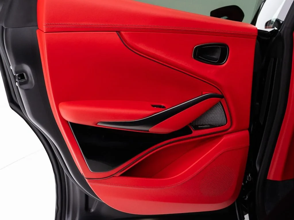 2026 Aston Martin DBX S interior, door panel, Spicy Red w/Stitching in Onyx Black