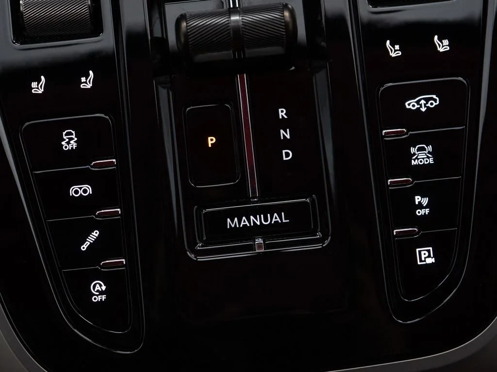 2026 Aston Martin DBX S interior, center console, Spicy Red w/Stitching in Onyx Black