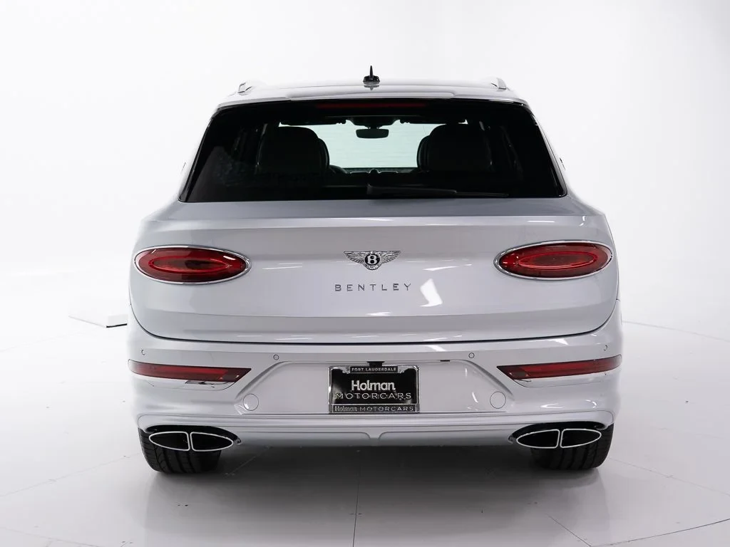 2026 Bentley Bentayga EWB Azure, rear three-quarter view, Moonbeam