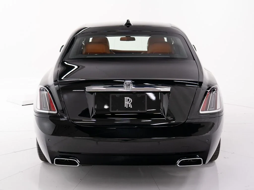 2027 Rolls-Royce Ghost, rear three-quarter view, Black Diamond