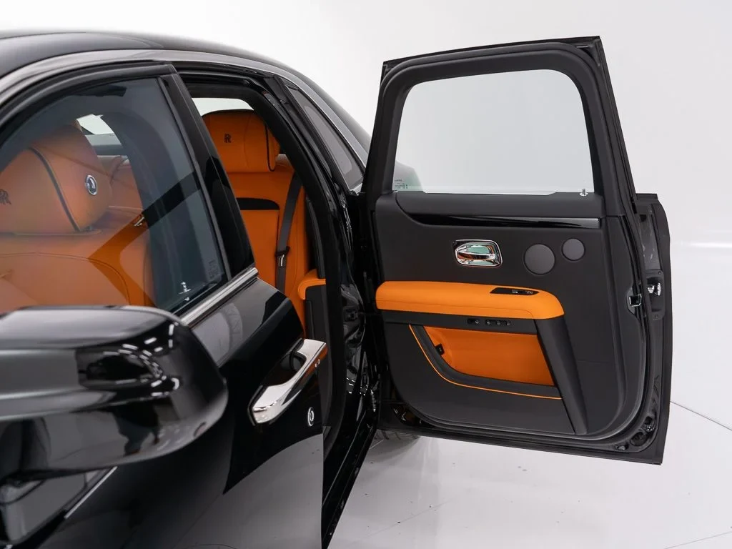 2027 Rolls-Royce Ghost interior, door panel, Mandarin / Black