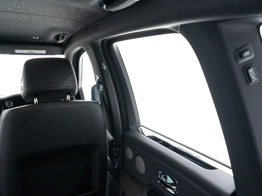 2027 Rolls-Royce Cullinan interior, door panel, Black w/Stitching in Arctic White