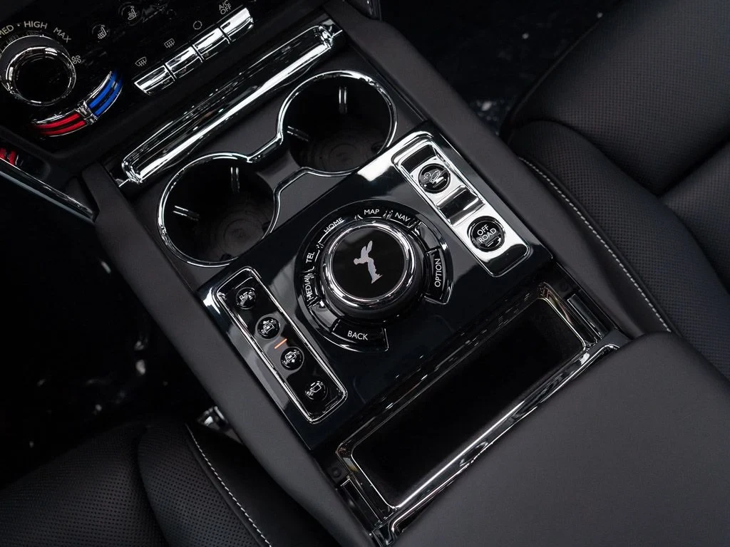 2027 Rolls-Royce Cullinan interior, center console, Black w/Stitching in Arctic White