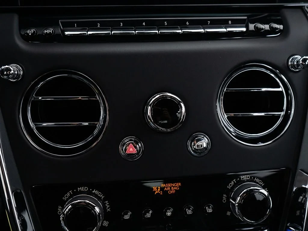 2027 Rolls-Royce Cullinan interior, center console, Black w/Stitching in Arctic White