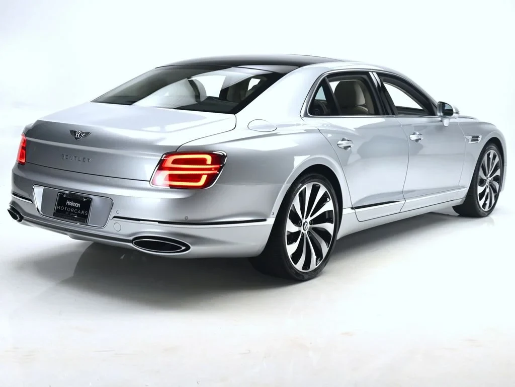 2026 Bentley Flying Spur V8, rear three-quarter view, Moonbeam