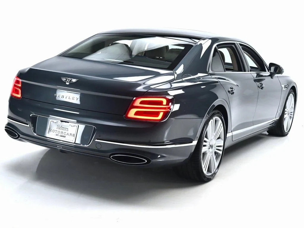 2026 Bentley Flying Spur Azure, rear three-quarter view, Storm Grey