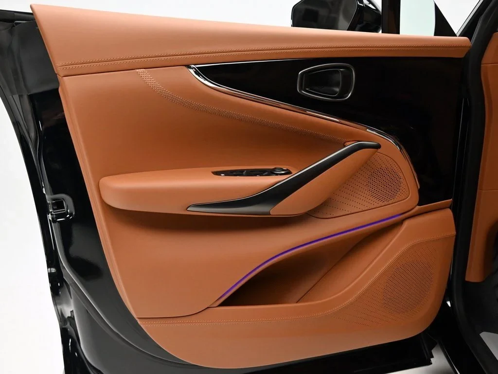 2026 Aston Martin DBX 707 interior, door panel, Centenary Saddle Tan