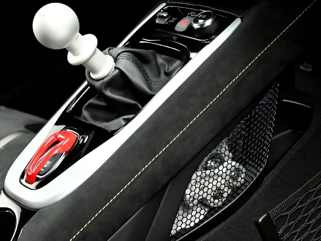 2027 Lotus Emira V6 SE interior, center console, Black with Yellow Stitching