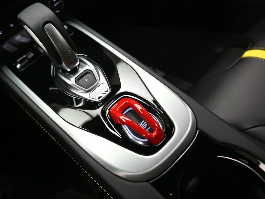 2027 Lotus Emira Turbo SE interior, center console, Black with Yellow Accents