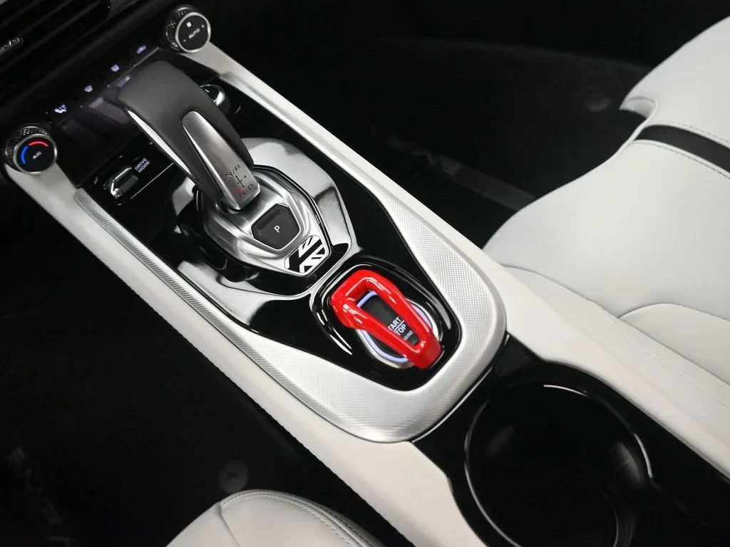 2026 Lotus Emira Turbo SE interior, center console, Ice Grey and Black