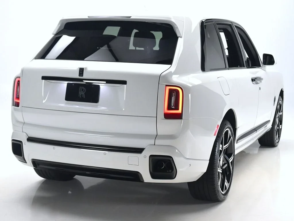 2027 Rolls-Royce Cullinan Black Badge, rear three-quarter view, English White