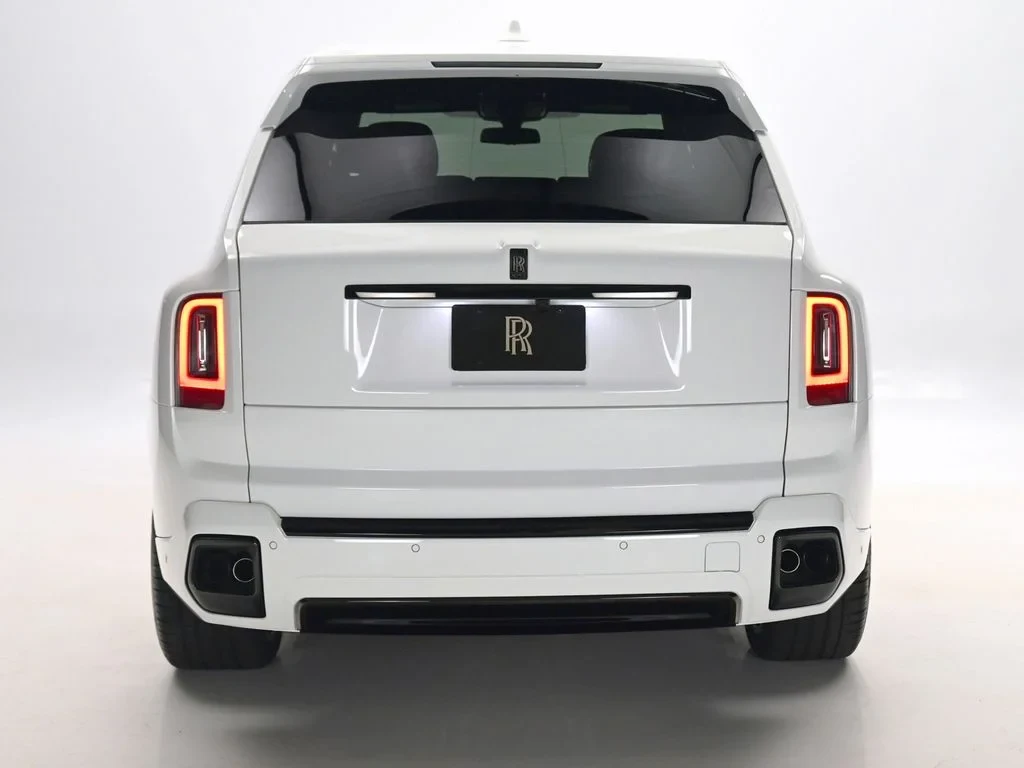 2027 Rolls-Royce Cullinan Black Badge, rear three-quarter view, English White