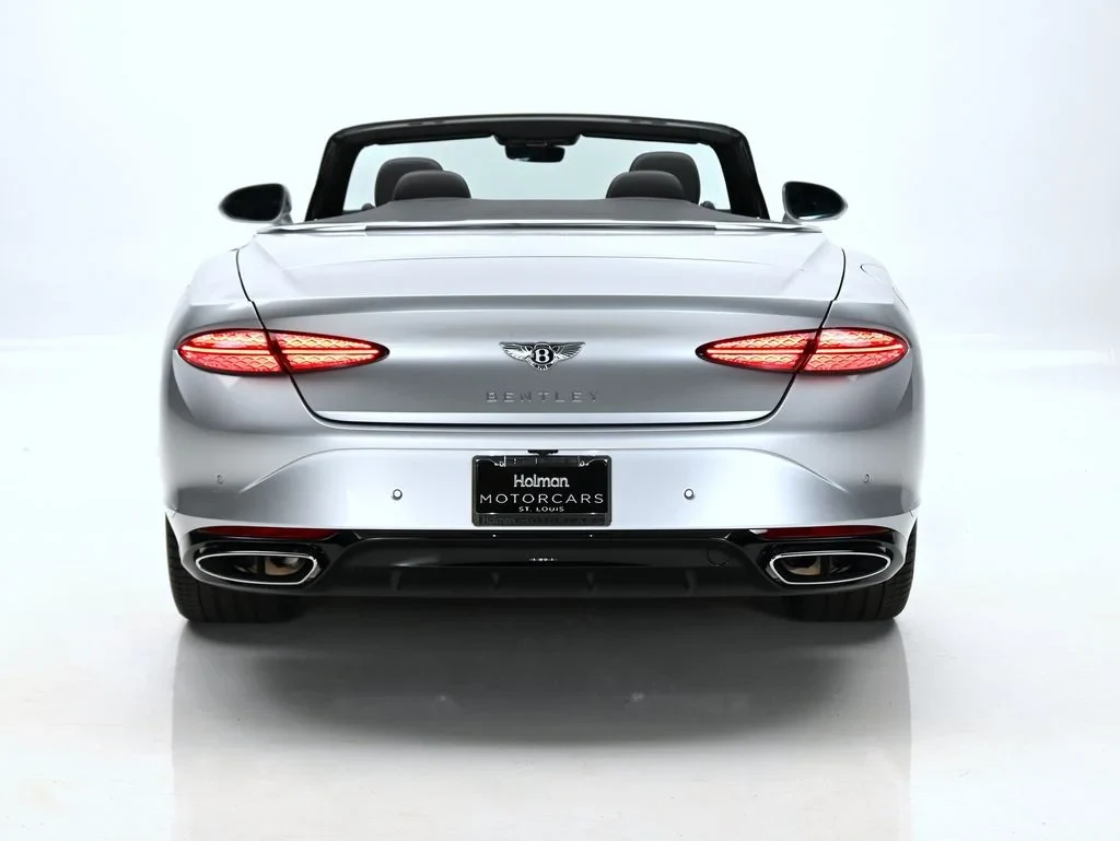 2026 Bentley Continental GTC, rear three-quarter view, Moonbeam