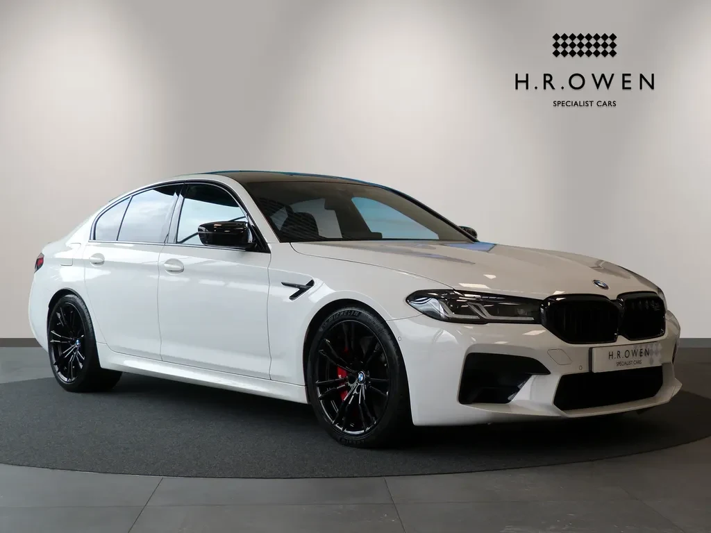 BMW M5, full-car front three-quarter view.