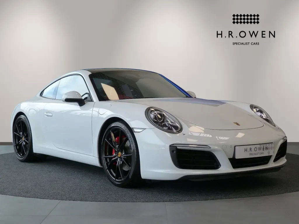 Porsche 911 Carrera, full-car front three-quarter view.