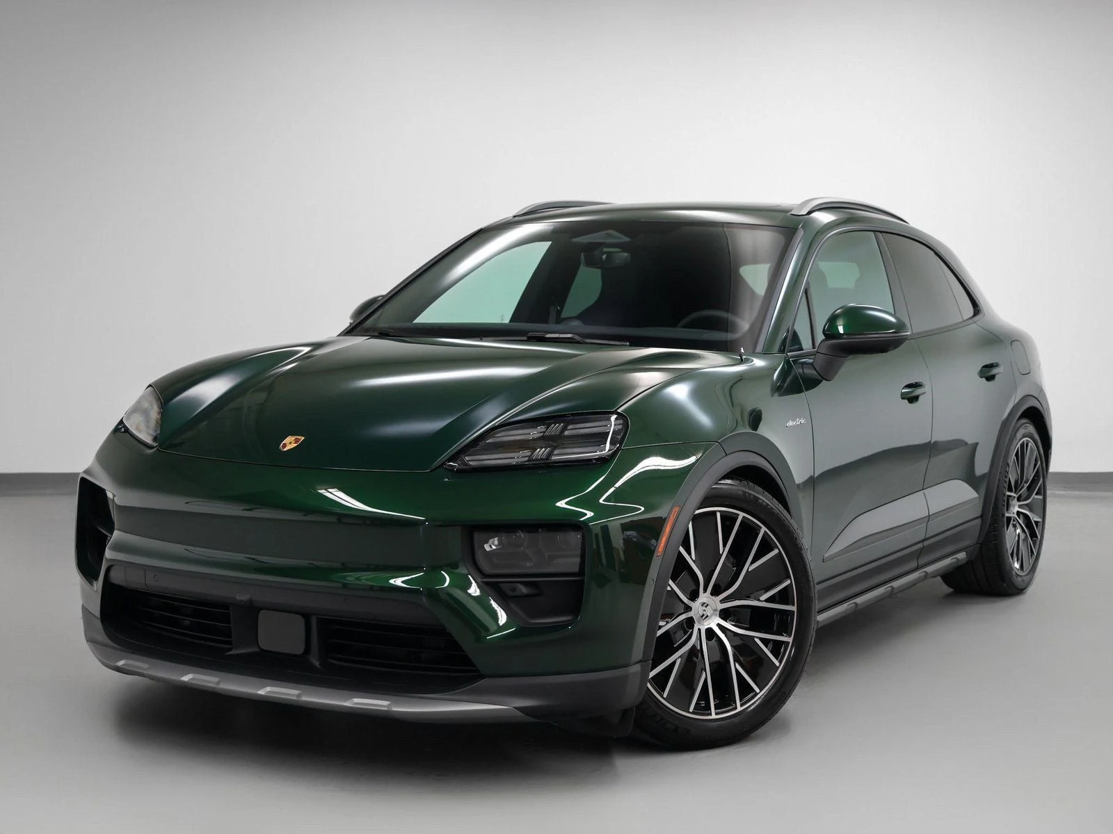 Porsche Macan 4 Electric (XAB) · Oak Green Metallic Neo · Indigo Auto Group