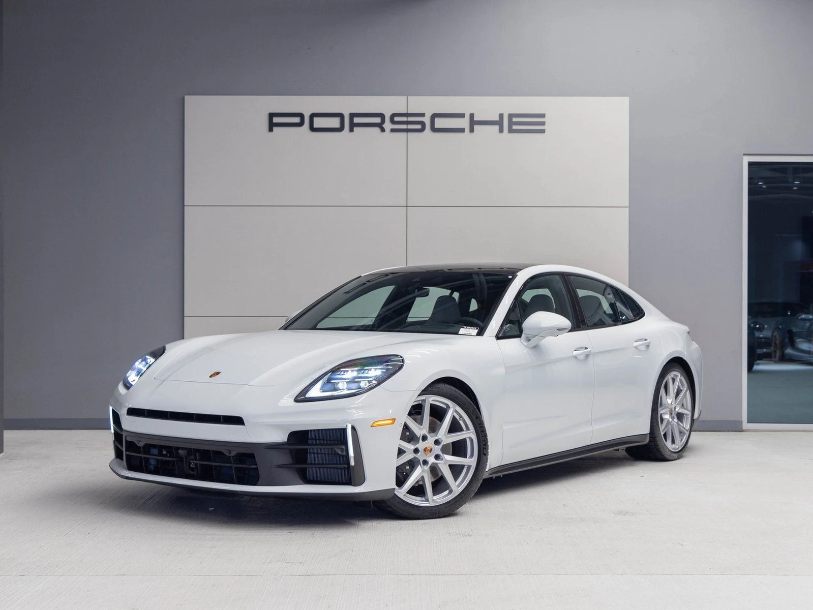 Porsche Panamera 4 (976) · Carrara White Metallic · Indigo Auto Group