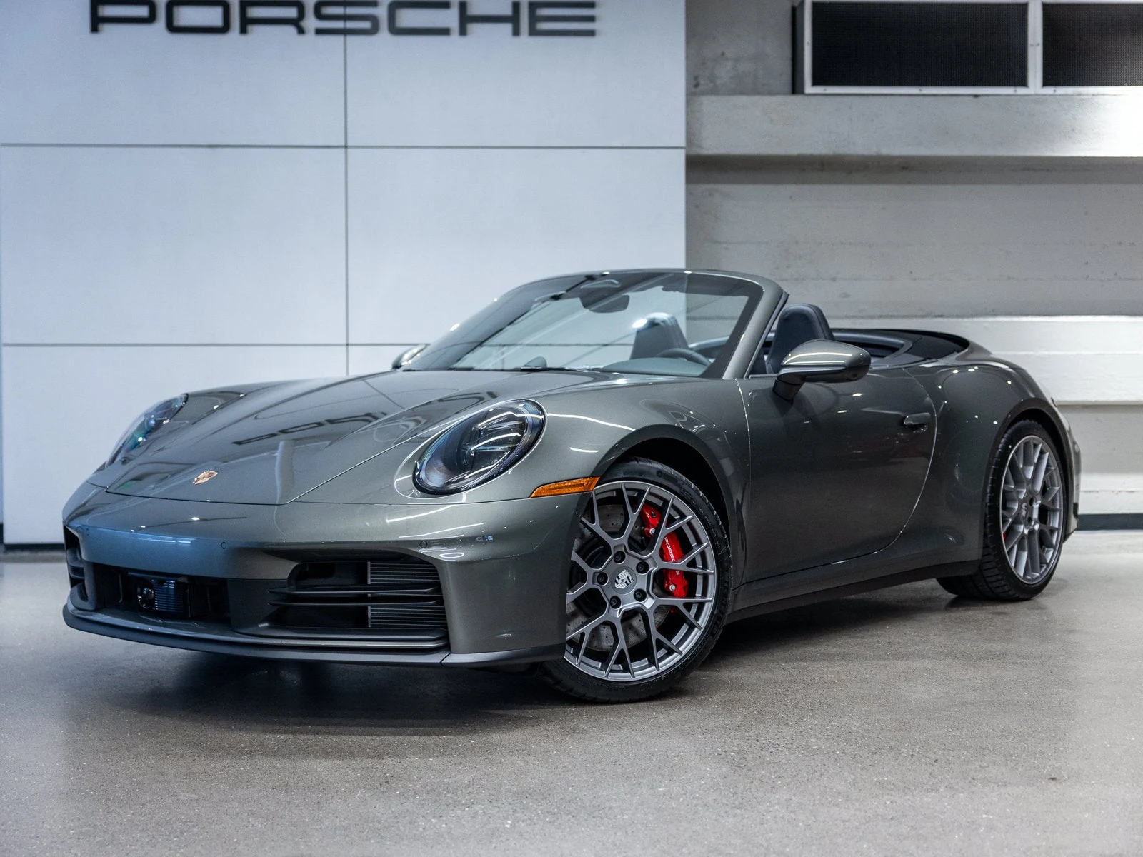 Porsche 911 (992.2) Carrera S Cabriolet · Aventurine Green Metallic · Indigo Auto Group