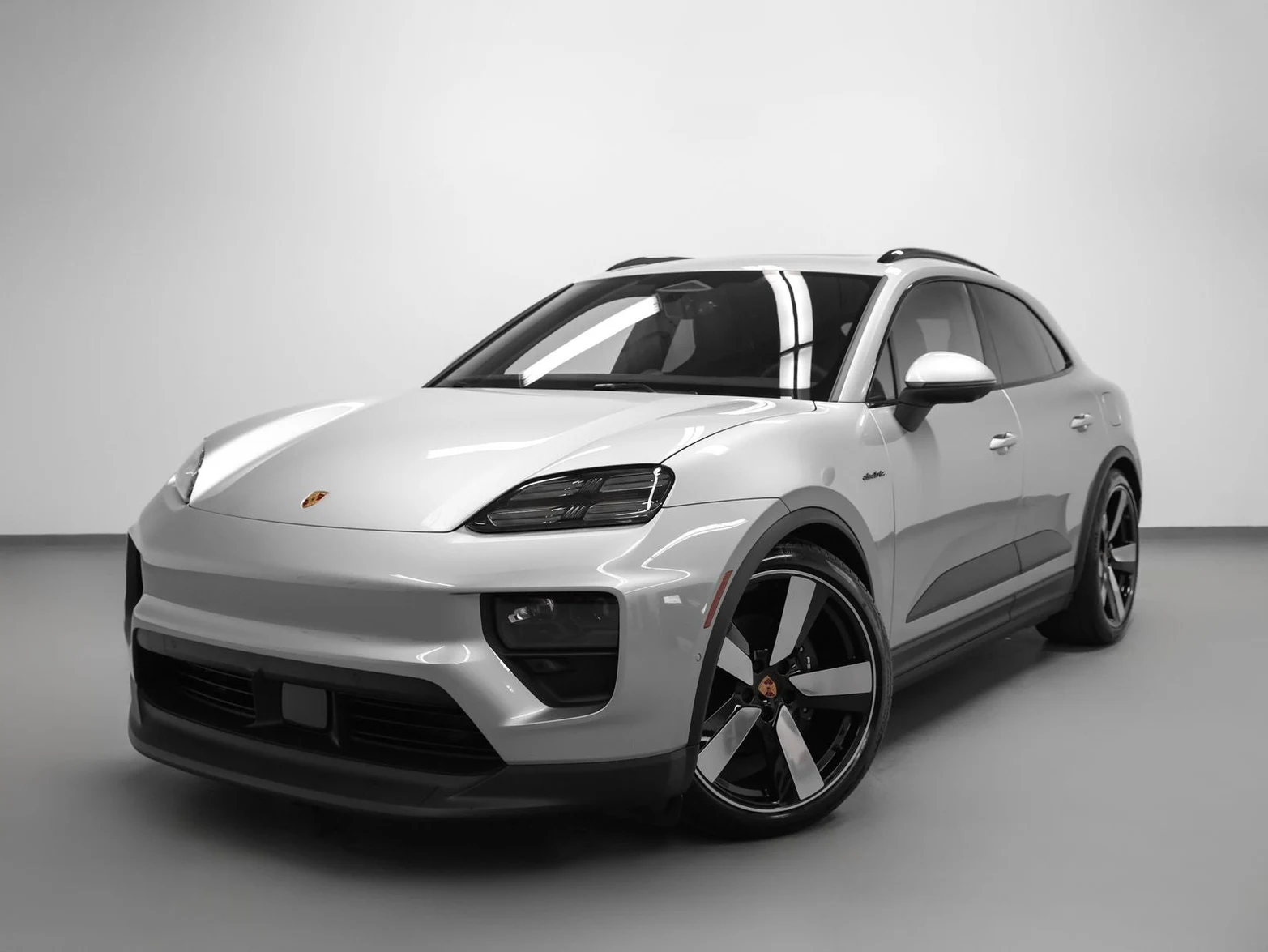 Porsche Macan 4 Electric (XAB) · Dolomite Silver Metallic · Indigo Auto Group