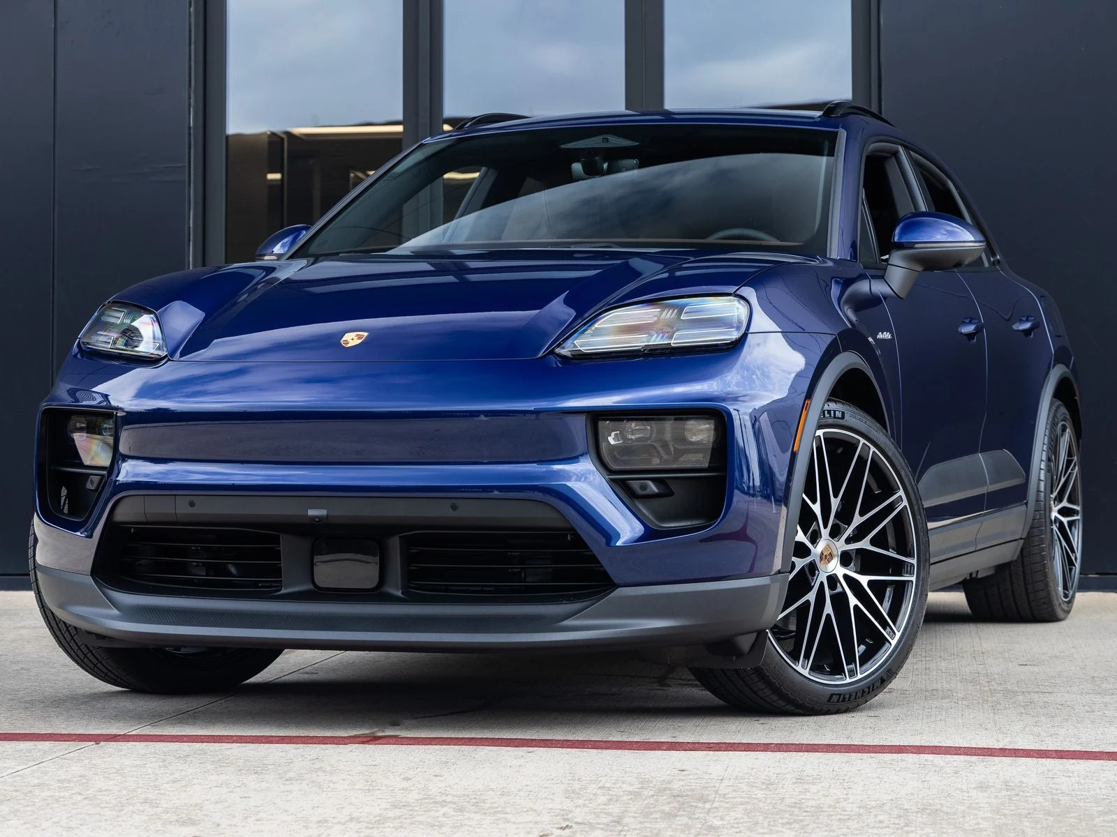 Porsche Macan 4 Electric (XAB) · Gentian Blue Metallic · Indigo Auto Group