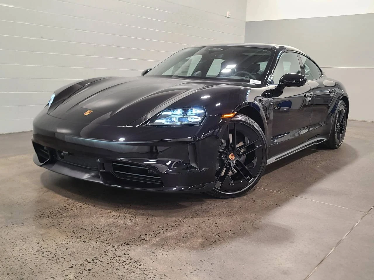 Porsche Taycan 4 Black Edition (2025 Update) · Jet Black Metallic · Indigo Auto Group