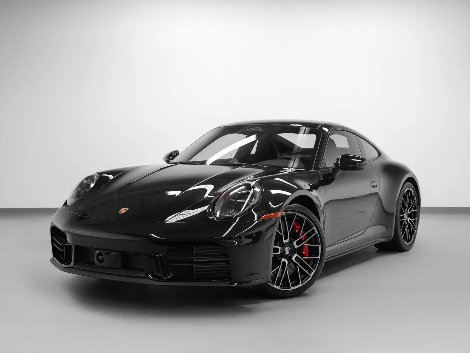 Porsche 911 Carrera S (992.2) · Jet Black Metallic · Indigo Auto Group