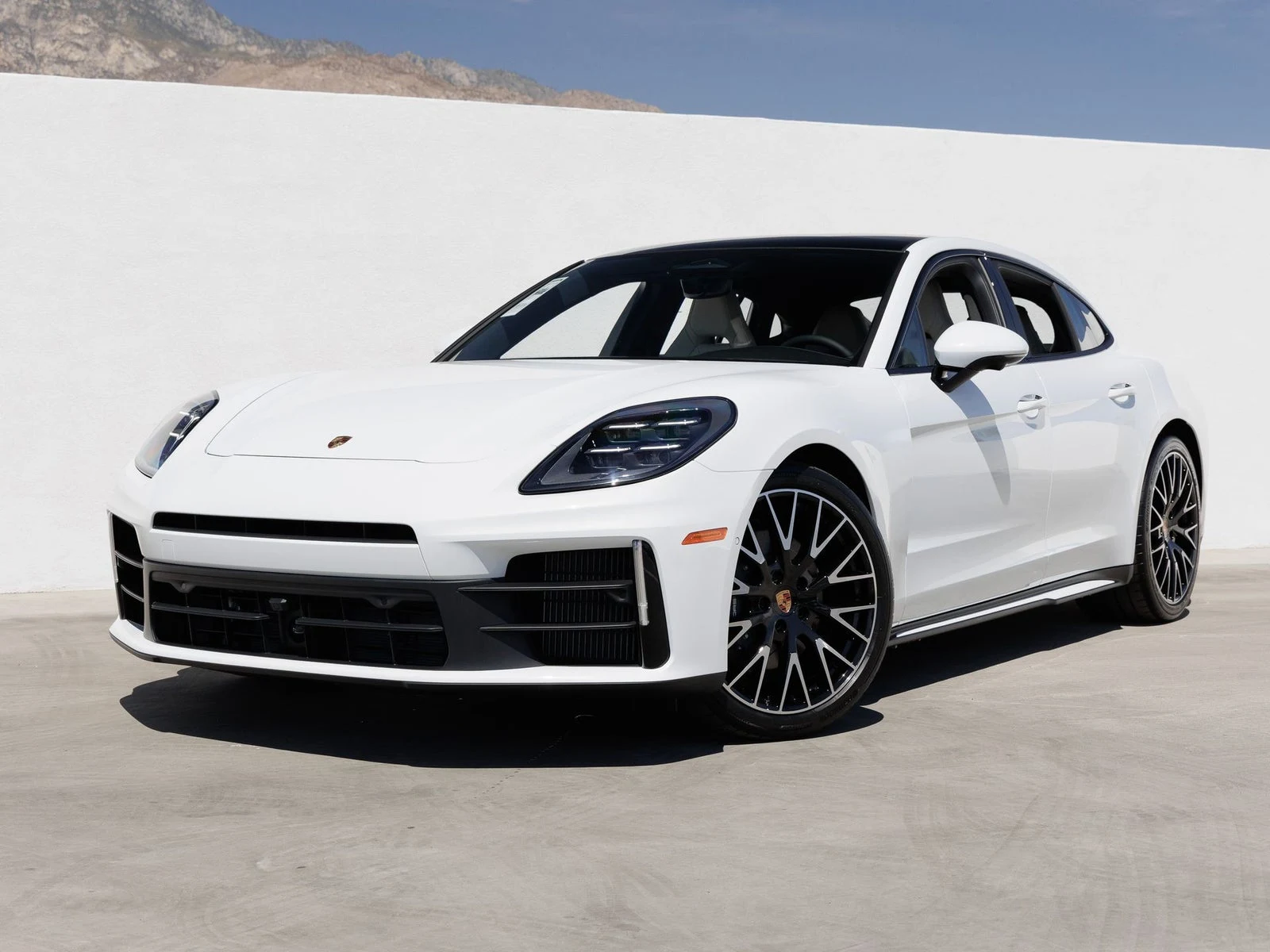 Porsche Panamera (976) · Carrara White Metallic · Indigo Auto Group