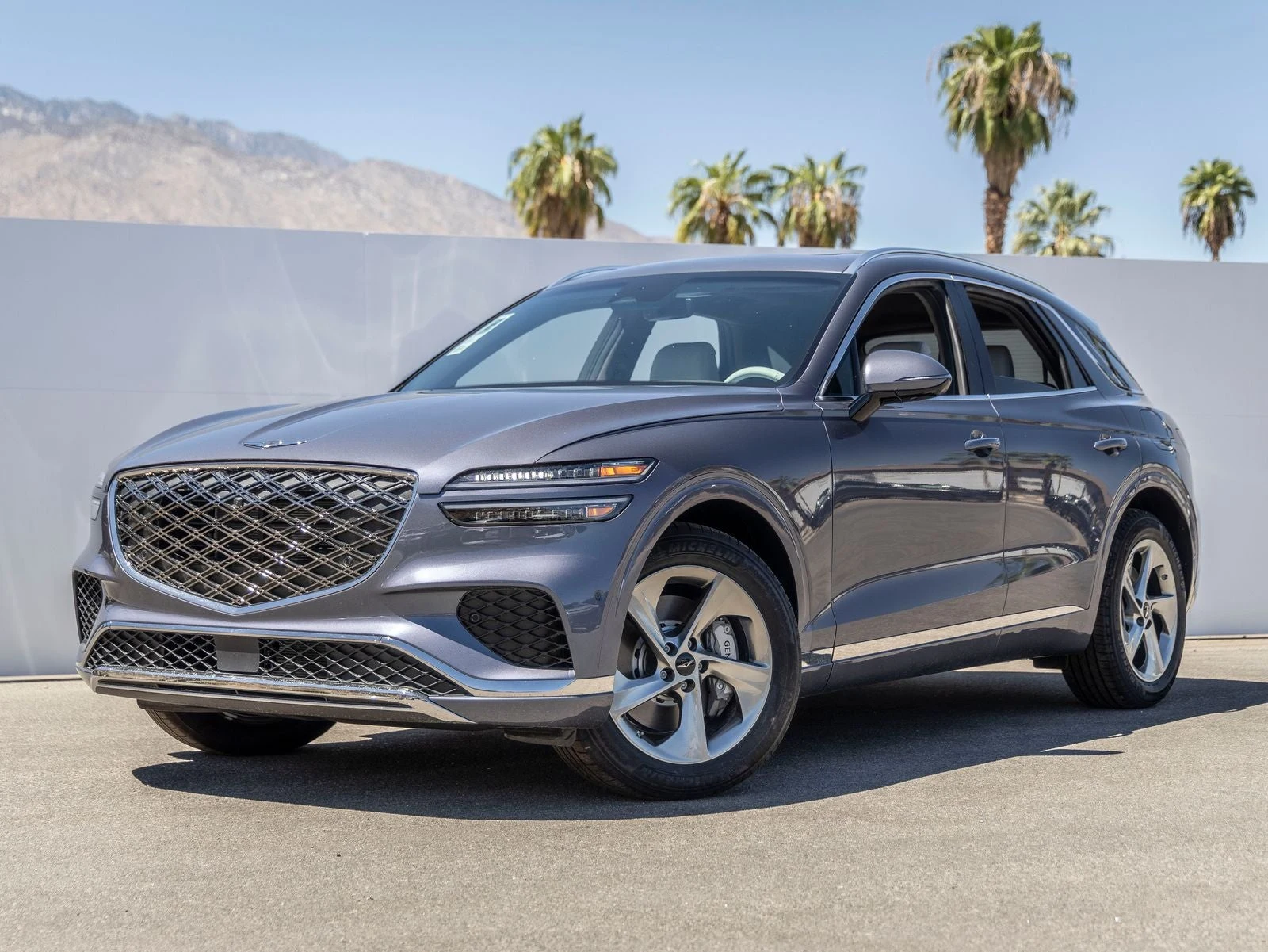 Genesis GV70 2.5T Advanced (2024 Update) · Ceres Blue · Indigo Auto Group