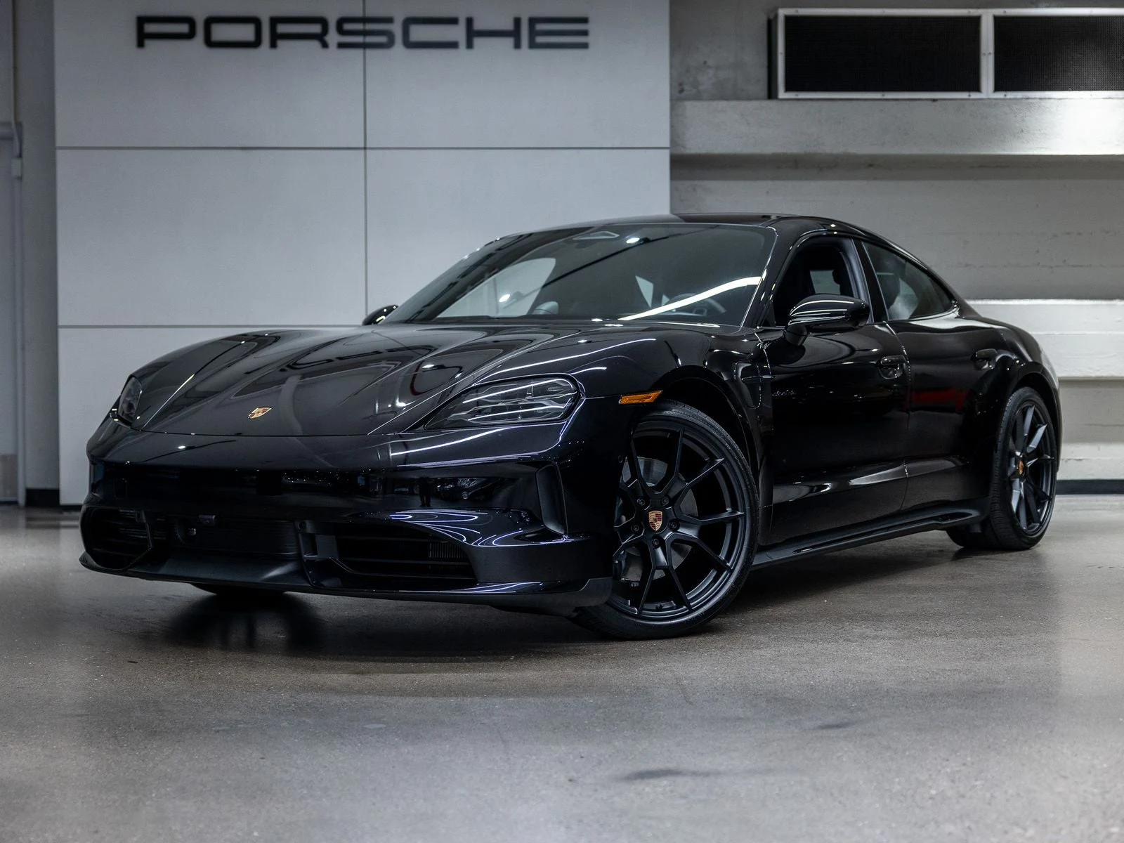 Porsche Taycan 4 Black Edition (2025 Update) · Jet Black Metallic · Indigo Auto Group
