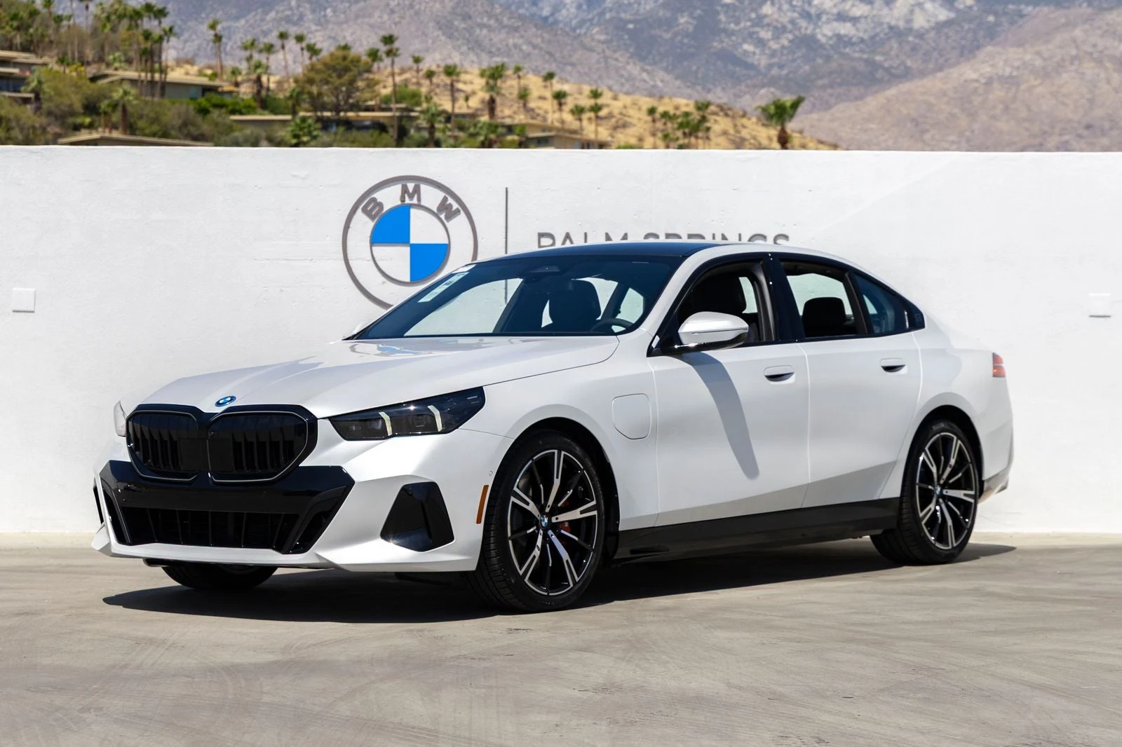 BMW 550e xDrive (G60) · Mineral White Metallic · Indigo Auto Group
