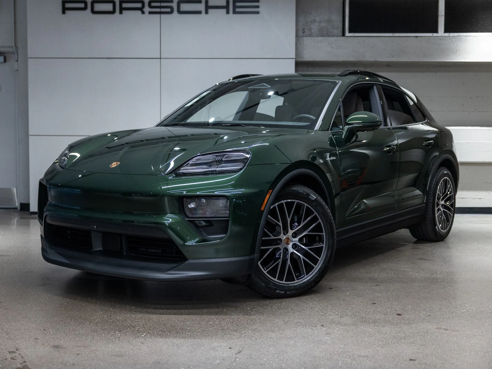 Porsche Macan Electric (XAB) · Oak Green Metallic Neo · Indigo Auto Group
