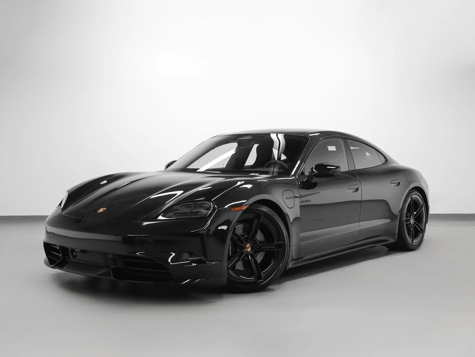 Porsche Taycan 4 Black Edition (2025 Update) · Jet Black Metallic · Indigo Auto Group